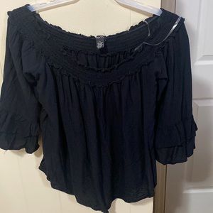 A see through blouse . I recommend wearing a tank top of some sort underneath.